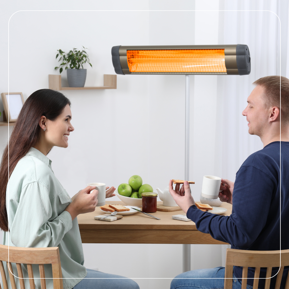 Bild eines Paares am Tisch mit Infrarotheizung – direkte Strahlungswärme für behagliches Heizen und geringeren Energieverbrauch.